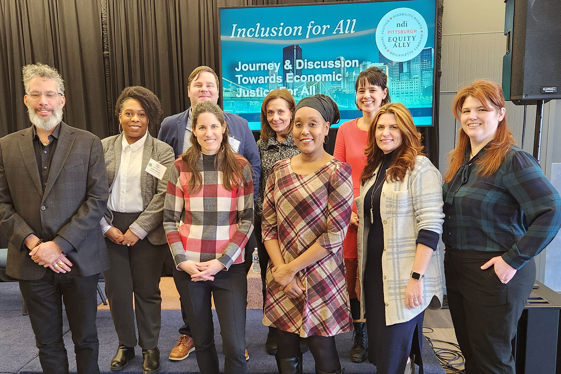 Group of members of the National Disability Institute and Cleveland Fed gather together in Pittsburg for the Journey * Discusion Towards Economic Justice For All Conference.