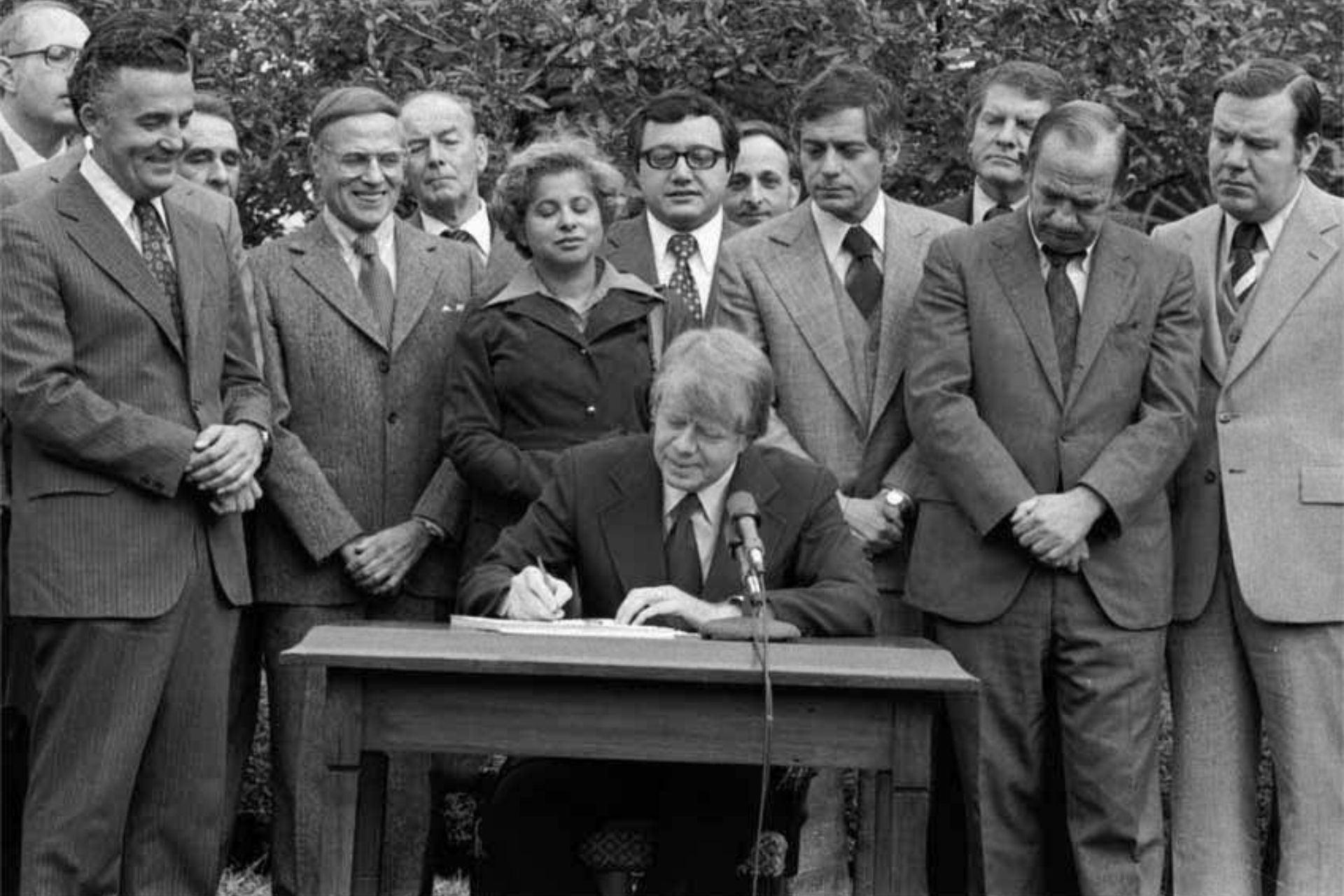 President Carter signs CRA into law