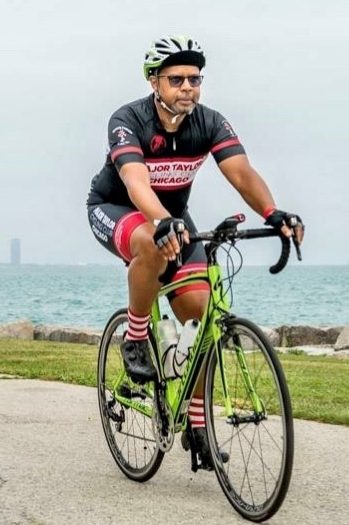 Gar Kelley cruising on his bike along the Chicago Lakefront Trail