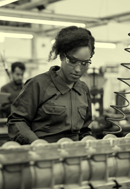 Female manufacturing worker on assembly line