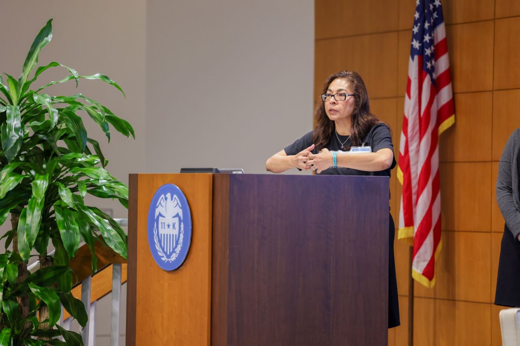 Maria Chaparro speaks to an audience at the Dallas Fed's Digital Inclusion Research Forum
