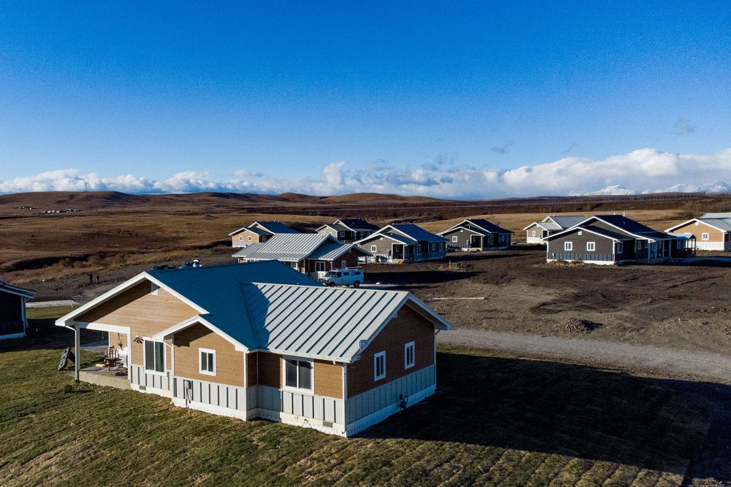 A housing development on the Blackfeet Reservation in Browning, Mont. Dependent Indian communities Dependent Indian communities are the second category of Indian country included in the main legal definition. As interpreted by the U.S. Supreme Court, the term refers to Native lands that are not reservations or allotted lands (smaller parcels of lands held in trust or restricted fee status), but that have been set aside by the federal government for the use of Native Americans under continuing federal superintendence (management). For example, Pueblo communities have been held to be “dependent Indian communities” and therefore “Indian country,” although their lands are held in fee title and are not part of a reservation. Indian allotments: Trust and restricted fee parcels Photo of a housing development A housing development on the Blackfeet Reservation in Browning, Mont.