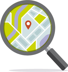 Magnifying glass icon above a map of streets and indicator.